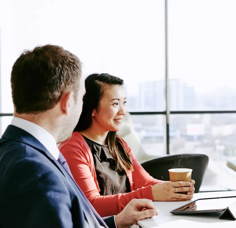 Three people in a meeting