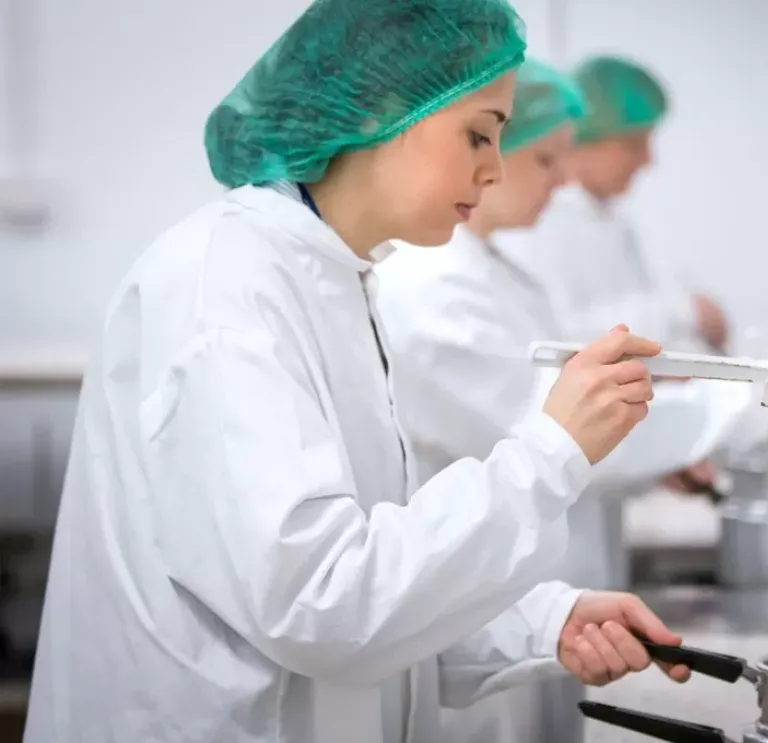 Woman with a spatula and saucepan