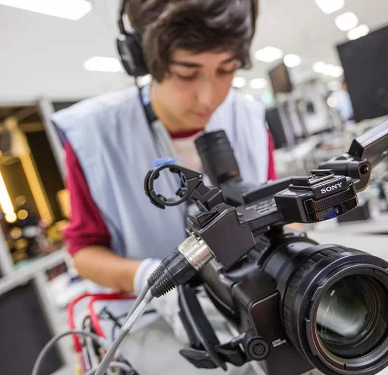 Man working with a video camera