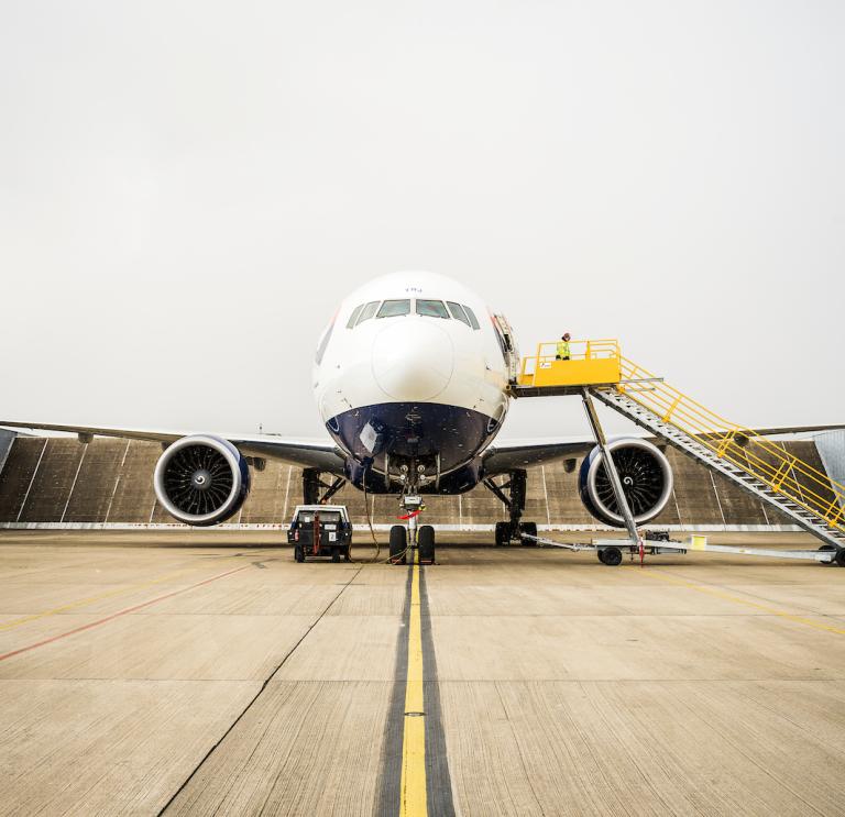 Stationary Airplane with some leaving via steps