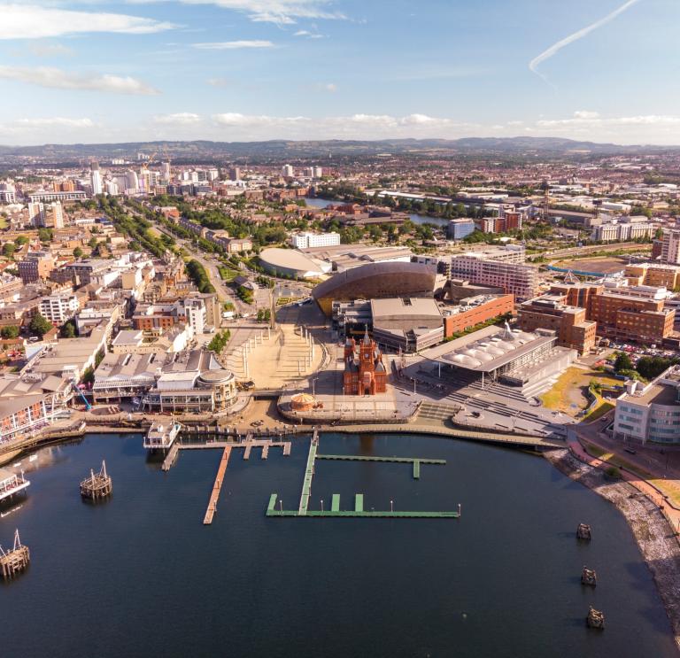 Cardiff Bay aerial photo including Pierhead Building, Wales Millennium Centre, Roald Dahl Plas/Oval Basin, Senedd, Tŷ Hywel