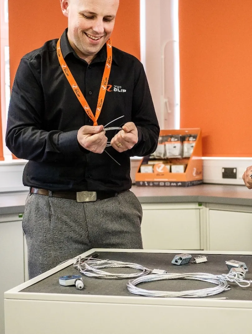 Two men with the company's products