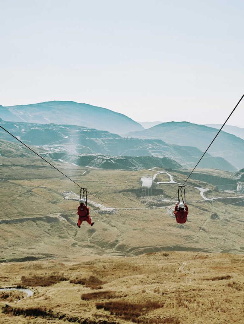 4 people on zip lines
