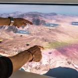 Pointing to the landscape on a screen