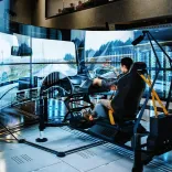 Man using a driving simulator