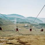 4 people on zip lines
