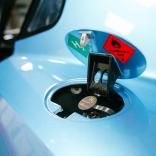 Car fuel cap open for hydrogen