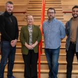 Nisien's Professor Pete Burnap, Lee Gainer and Tyrone Stuart with Economy Secretary Rebecca Evans