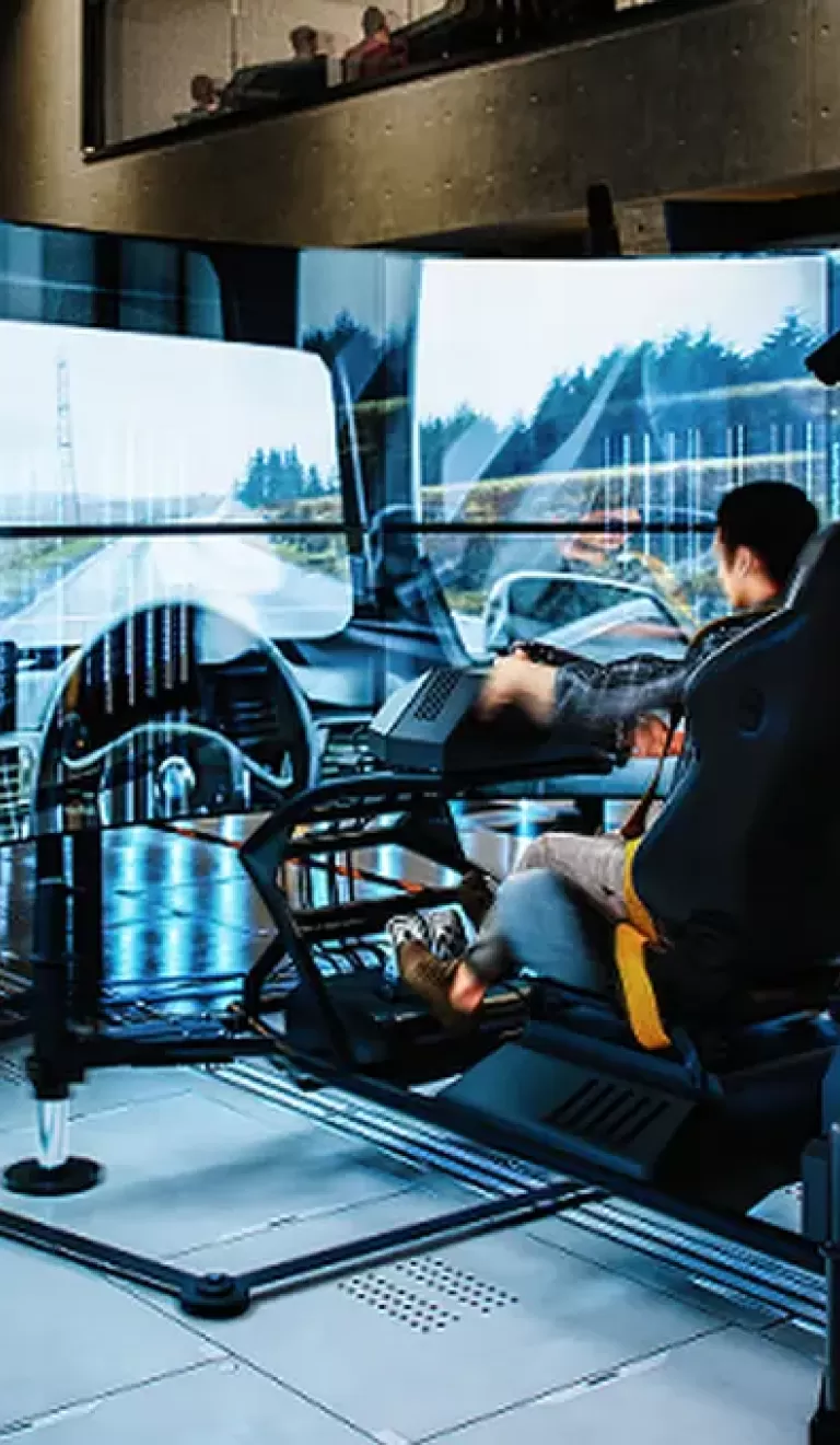 Man using a driving simulator